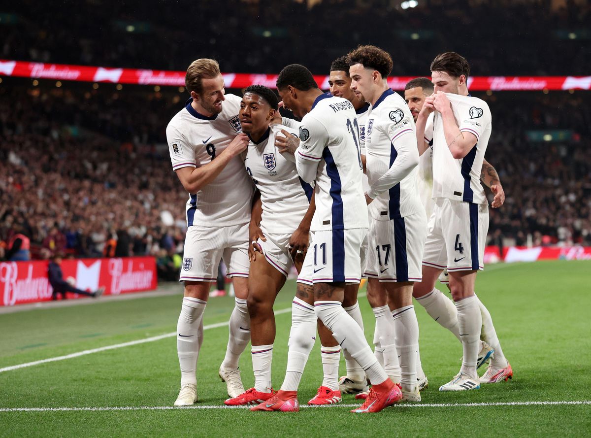 England players celebrate after Myles Lewis-Skelly scored the opening goal in the 2026 World Cup qualifying match against Albania at Wembley Stadium, London, March 2025