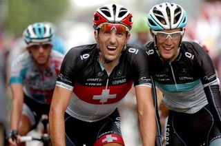 Leopard Trek teammates Fabian Cancellara and Andy Schleck don't seem to mind the inclement weather.