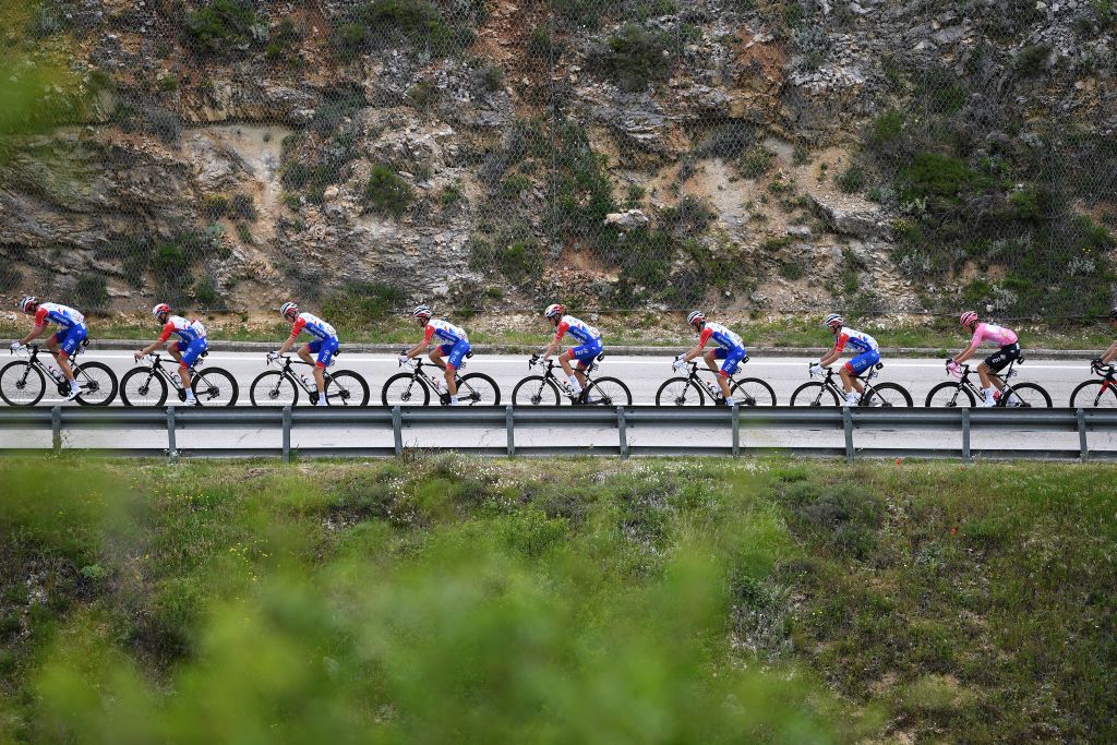 CAMPO FELICE ROCCA DI CAMBIO ITALY MAY 16 Rudy Molard of France Matteo Badilatti of Switzerland Antoine Duchesne of Canada Simon Guglielmi of France Romain Seigle of France Sebastien Reichenbach of Switzerland Attila Valter of Hungary Pink Leader Jersey Lars Van Den Berg of Netherlands and Team Groupama FDJ lead The Peloton passing through Aldeno 194m during the 104th Giro dItalia 2021 Stage 9 a 158km stage from Castel di Sangro to Campo Felice Rocca di Cambio 1665m girodiitalia Giro UCIworldtour on May 16 2021 in Campo Felice Rocca di Cambio Italy Photo by Tim de WaeleGetty Images