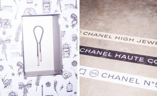 A piece of Chanel jewellery in a display box