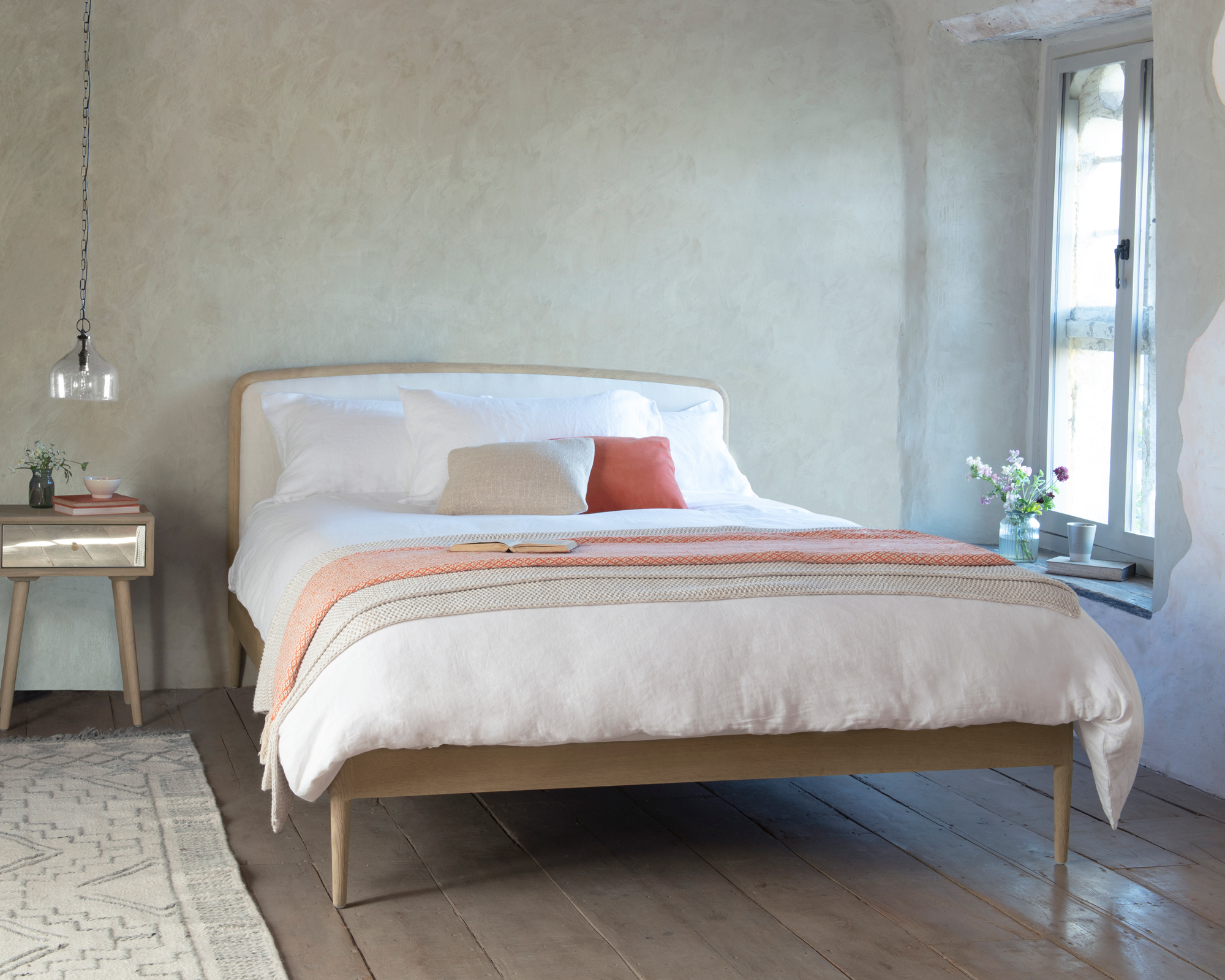 Relaxed summery bedroom scheme with smoothie inspired bedlinen in light and pastel shades.