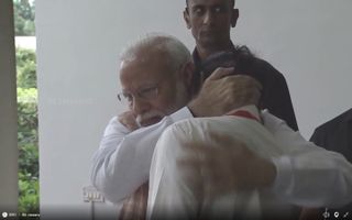 Indian Prime Minister Narendra Modi (left) consoles K. Sivan, the head of the Indian Space Research Organisation, after the apparent failure of the Chandrayaan-2 lunar landing attempt of Sept. 6, 2019.