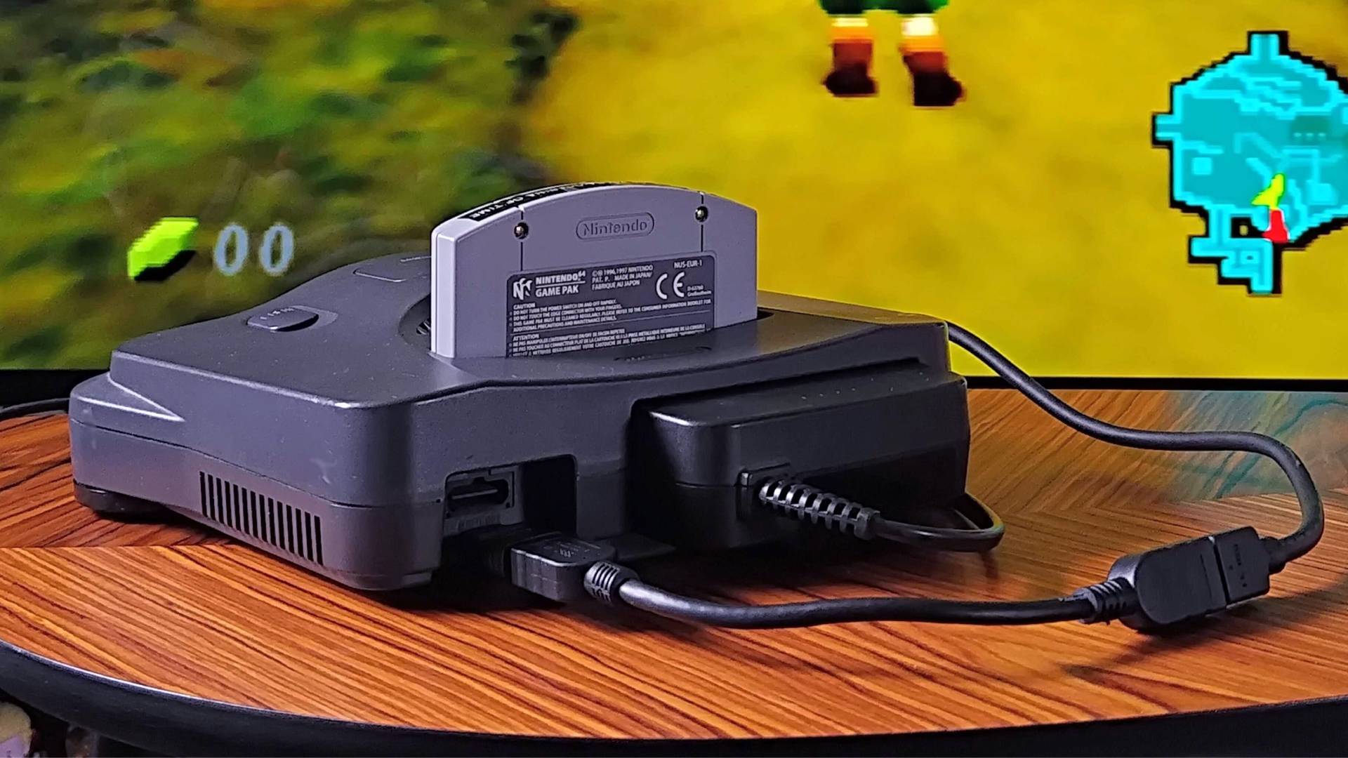 N64 on woodgrain cable with HDMI cable connected.