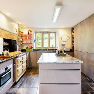 kitchen with marble worktop and white ceiling
