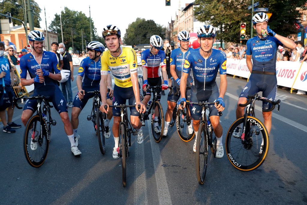 KRAKOW POLAND AUGUST 15 LR Tim Declercq of Belgium Alvaro Jose Hodeg Chagui of Colombia Joo Pedro Gonalves Almeida of Portugal Yellow Leader Jersey Rmi Cavagna of France Stijn Steels of Belgium Mikkel Honor Frlich of Denmark Ian Garrison of The United States and Team Deceuninck QuickStep celebrates at finish line as race lead winner during the 78th Tour de Pologne 2021 Stage 7 a 145km stage from Zabrze to Krakw TourdePologne TDP2021 UCIWT on August 15 2021 in Krakow Poland Photo by Bas CzerwinskiGetty Images