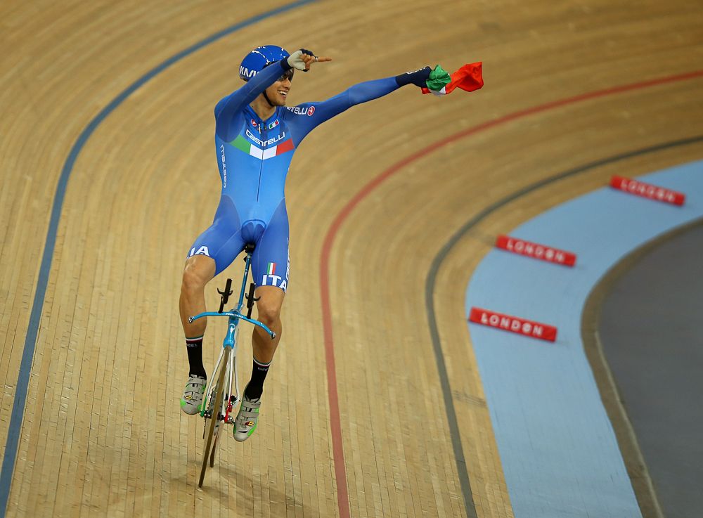 Filippo Ganna of Italy celebrates after winning The Men's Individual Pursuit
