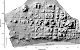 Archaeologists have mapped an early Mayan city, revealing the city used a rigid grid system with the main ceremonial way aligned east to west.