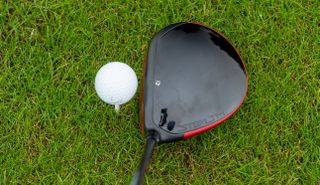 The TaylorMade Stealth 2 Driver positioned behind a golf ball at address