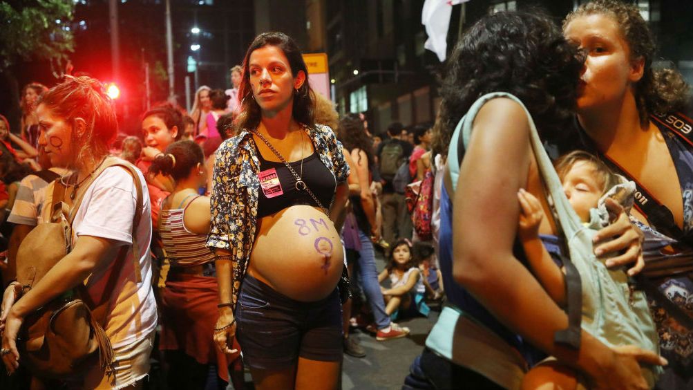 A pregnant woman takes part in an International Women's Day demonstration in Rio de Janeiro