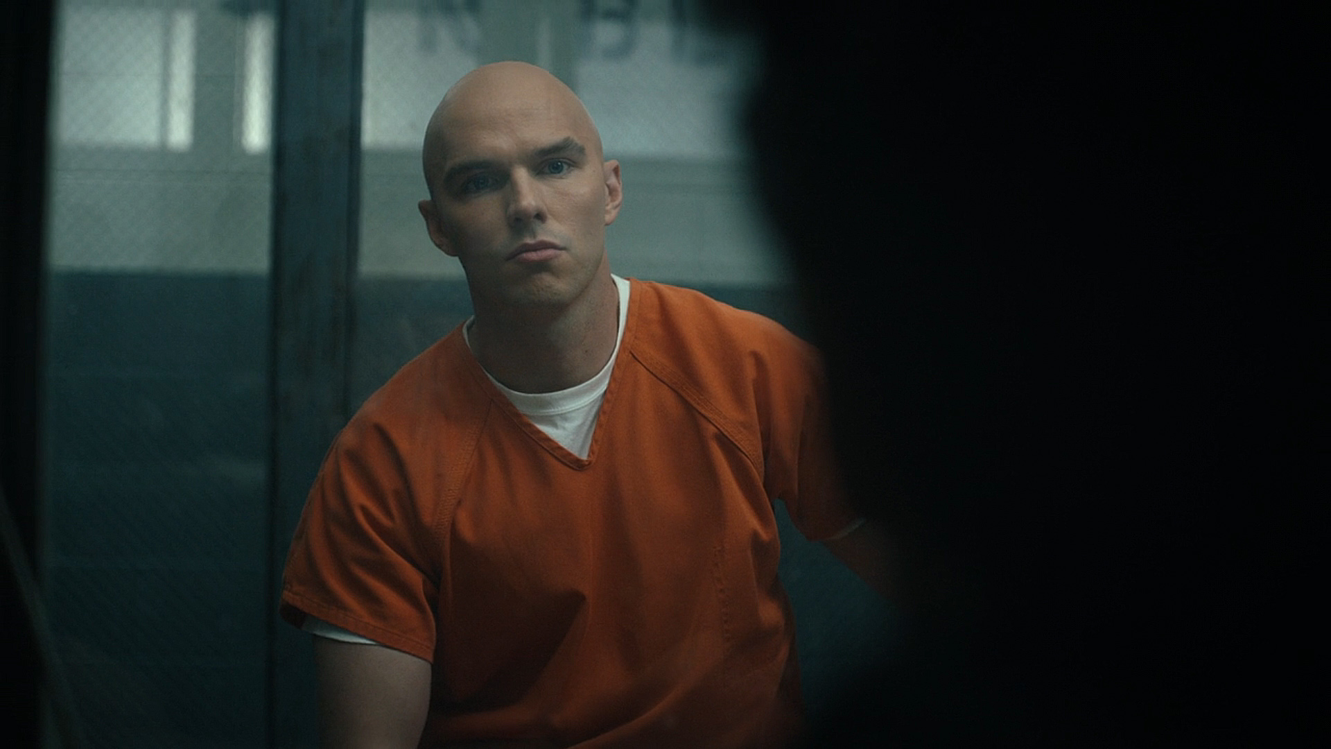 Lex Luthor wearing an orange prison jumpsuit in Peacemaker season 2 episode 6