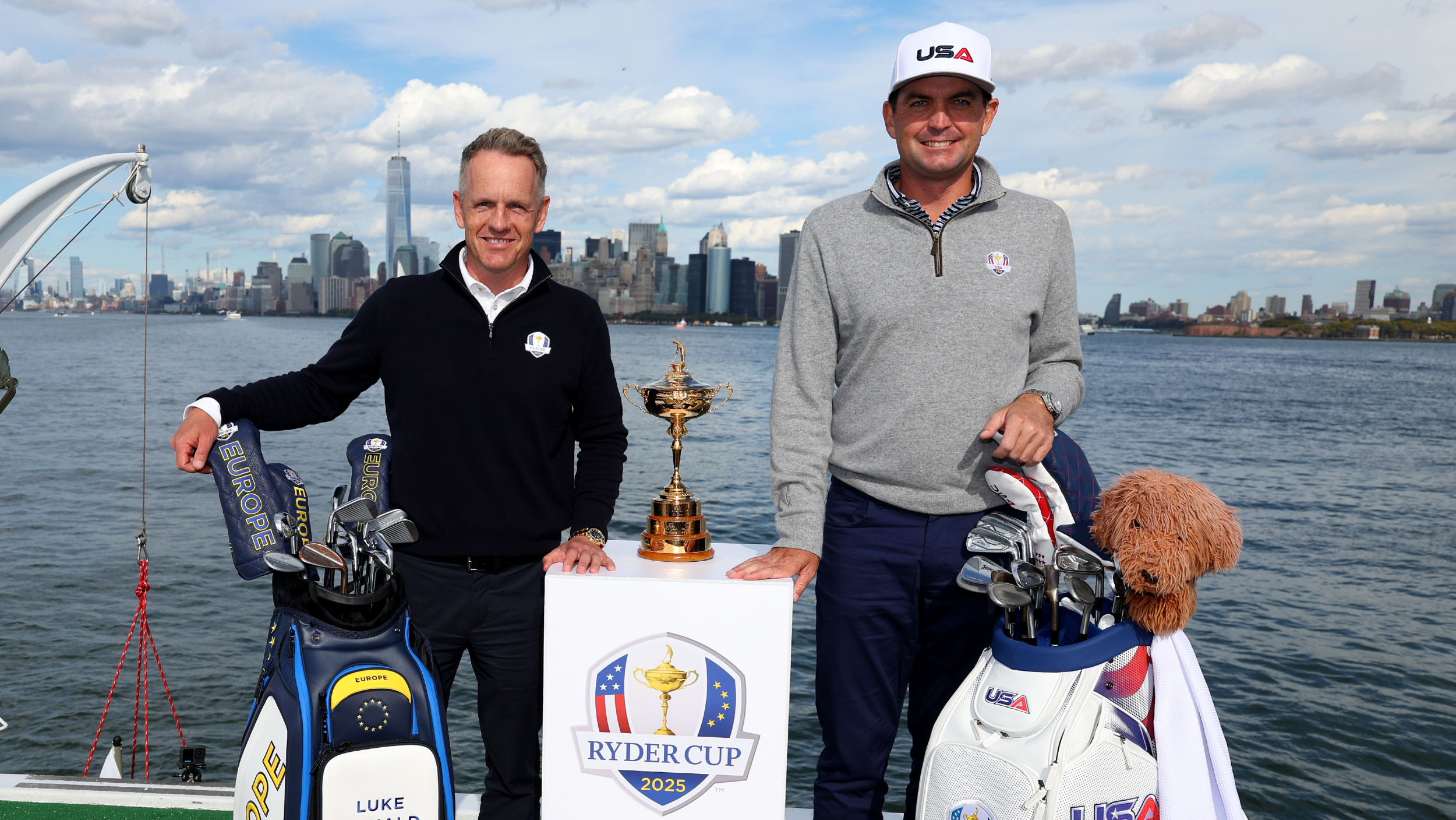 Luke Donald and Keegan Bradley pose for a photo with the Ryder Cup 
