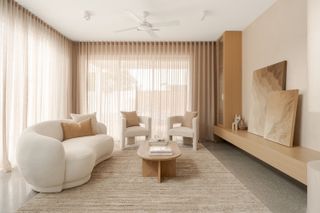 A living room drenched in beige tones