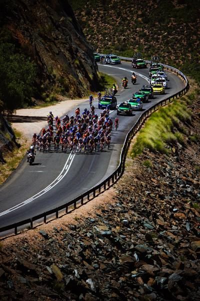 The peloton climbing the pass.