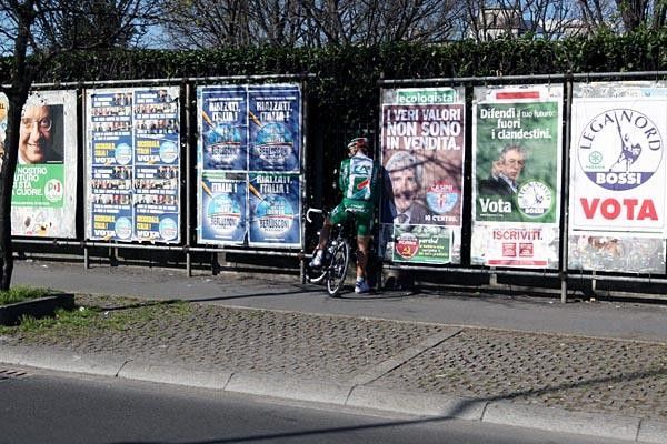 The peloton passed a few billboards.