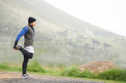 A runner stretches.