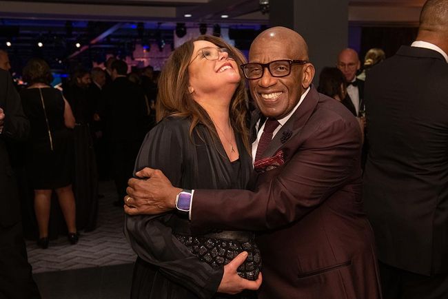 Honorees Rachael Ray and Al Roker share a moment at the opening reception.