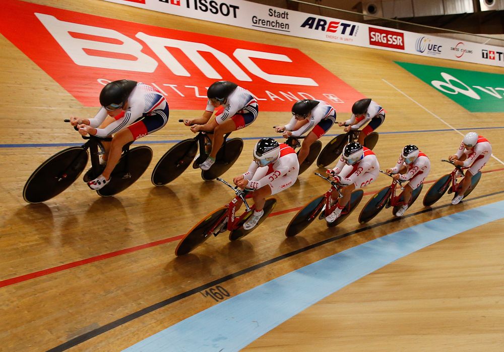 Great Britain overtakes Poland during the team pursuit.