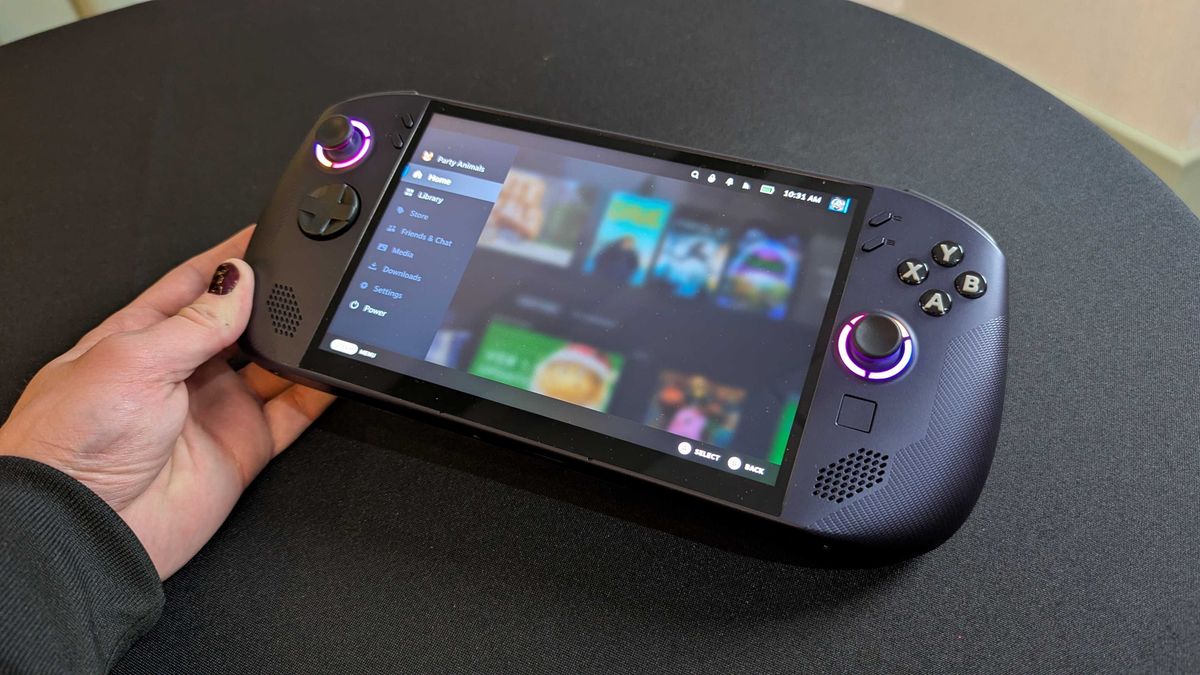 A Lenovo Legion Go S with SteamOS held in the hand.