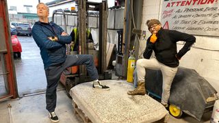 Tim Shaw and Fuzz Townshend pose in the workshop during filming on Car S.O.S season 12