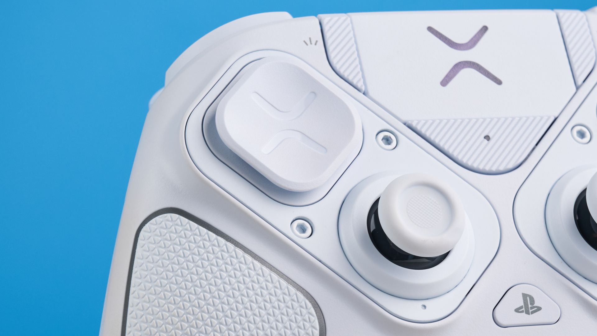 A white Turtle Beach Victrix Pro BFG Reloaded controller for the PS5