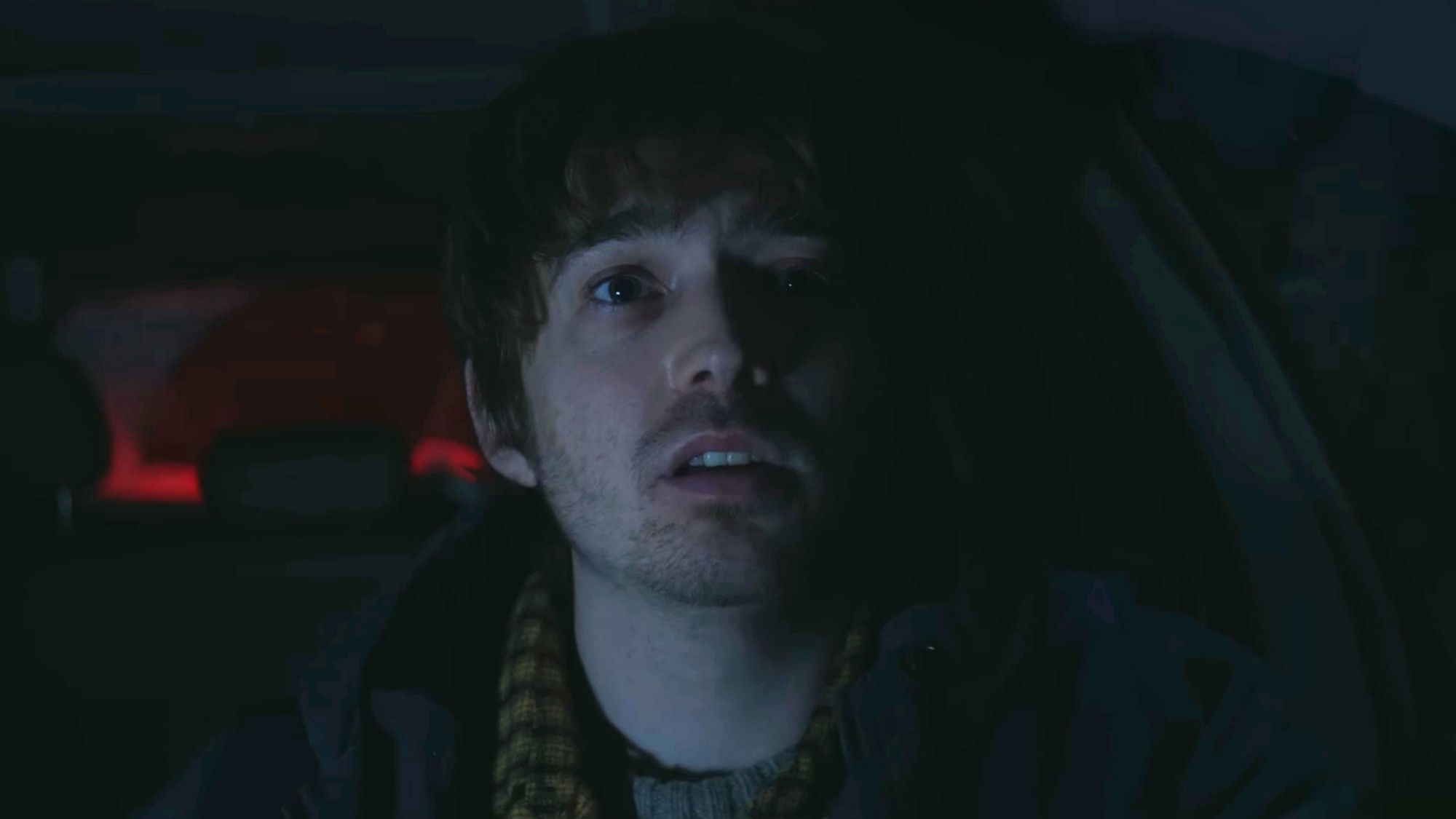 Austin Abrams driving in Resident Evil.
