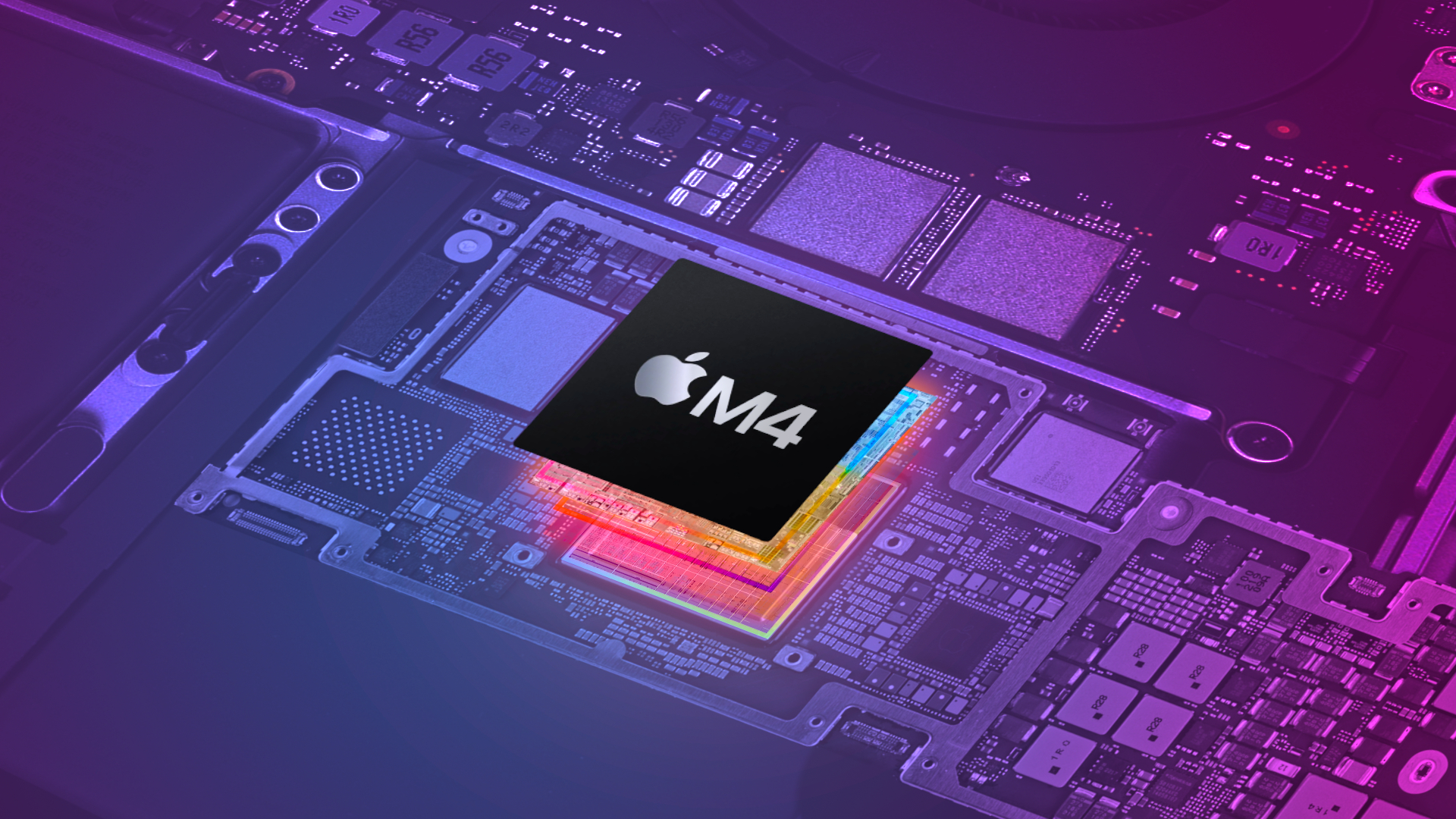 Photographic illustration of the colorful Apple M4 chip popping out of the MacBook Pro control board