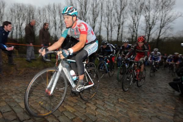 a mud covered Philippe Gilbert (Omega Pharma-Lotto)
