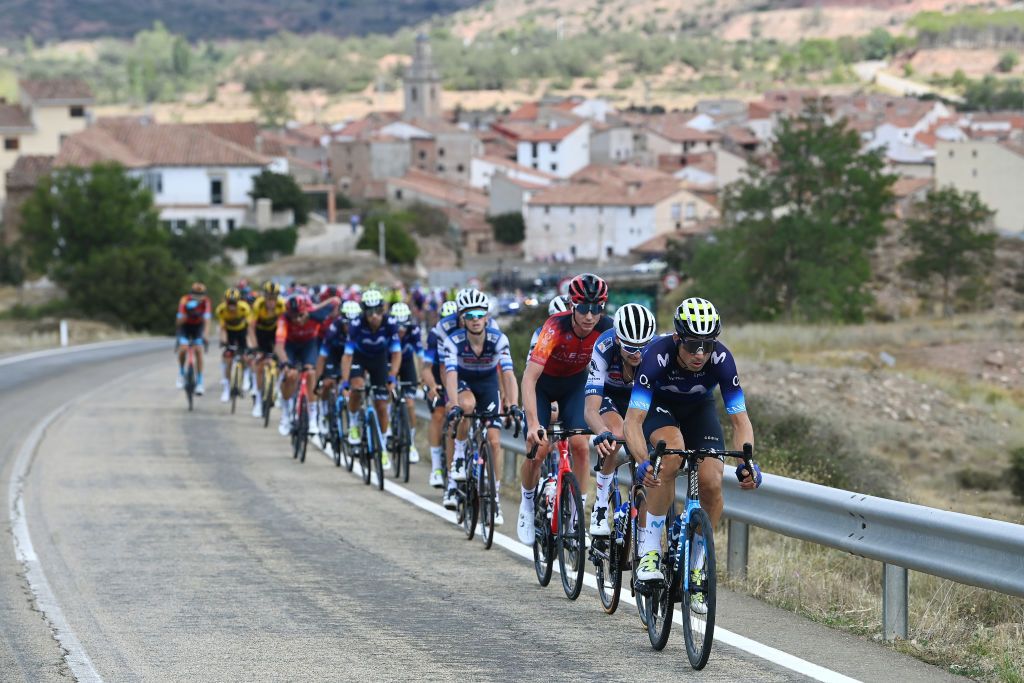 OBSERVATORIO ASTROFSICO DE JAVALAMBRE SPAIN AUGUST 31 LR Kim Heiduk of Germany and Team INEOS Grenadiers Pieter Serry of Belgium and Team Soudal Quick Step and Imanol Erviti of Spain and Movistar Team lead the peloton during the 78th Tour of Spain 2023 Stage 6 a 1831km stage from La Vall dUix to Observatorio Astrofsico de Javalambre 1947m UCIWT on August 31 2023 in Observatorio Astrofsico de Javalambre Spain Photo by Tim de WaeleGetty Images