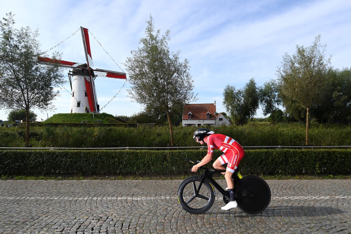 BRUGES BELGIUM SEPTEMBER 21 Gustav Wang of Denmark sprints in front of a windmill in Damar City during the 94th UCI Road World Championships 2021 Men Junior ITT a 223km Individual Time Trial race from KnokkeHeist to Bruges flanders2021 ITT on September 21 2021 in Bruges Belgium Photo by Tim de WaeleGetty Images