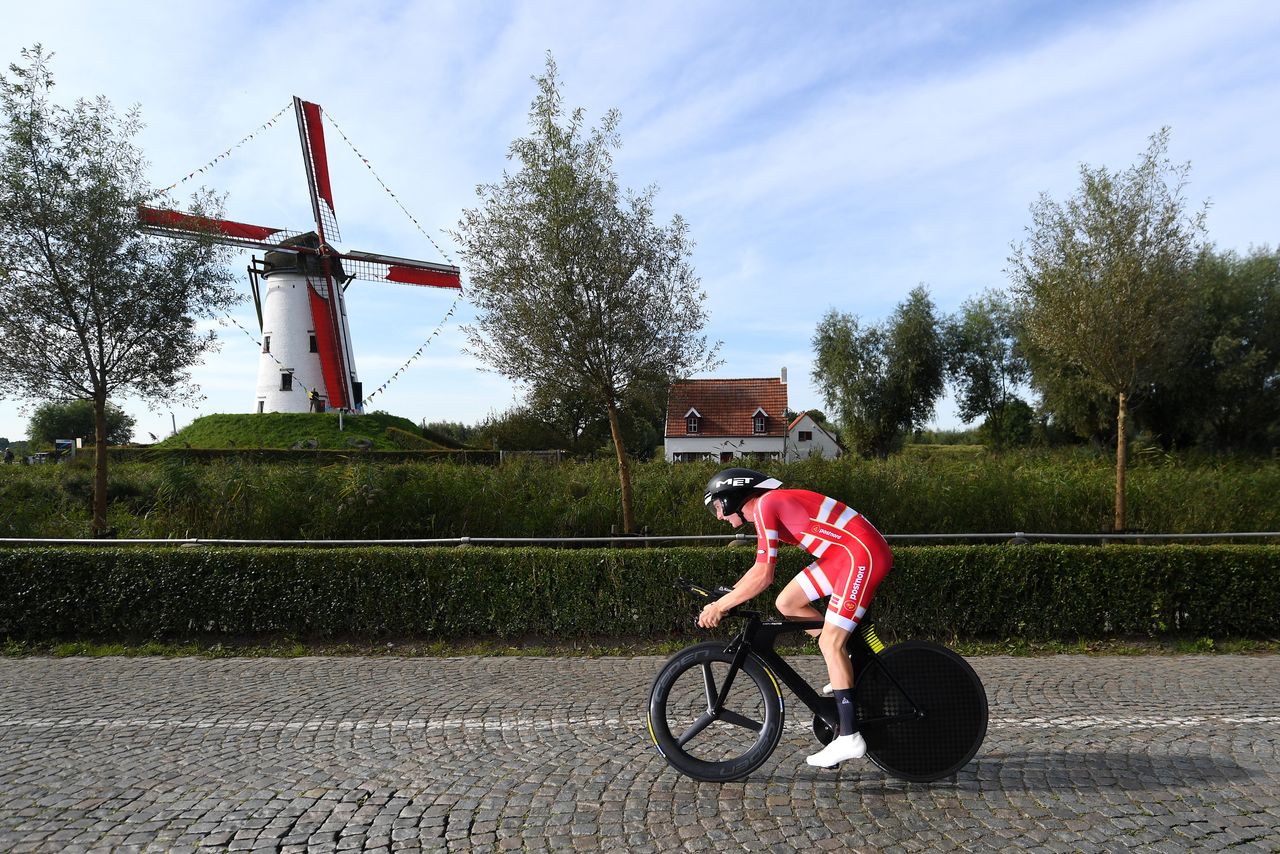BRUGES BELGIUM SEPTEMBER 21 Gustav Wang of Denmark sprints in front of a windmill in Damar City during the 94th UCI Road World Championships 2021 Men Junior ITT a 223km Individual Time Trial race from KnokkeHeist to Bruges flanders2021 ITT on September 21 2021 in Bruges Belgium Photo by Tim de WaeleGetty Images
