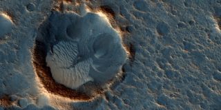 Mars Reconnaissance Orbiter imaged the landing site depicted in the 2015 blockbuster film "The Martian".