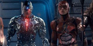 Justice League Cyborg and The Flash walking off of a ship in the middle of the team