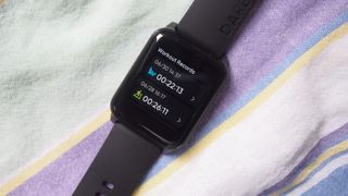 Close-up of Realme Watch 2 face, showing workout records