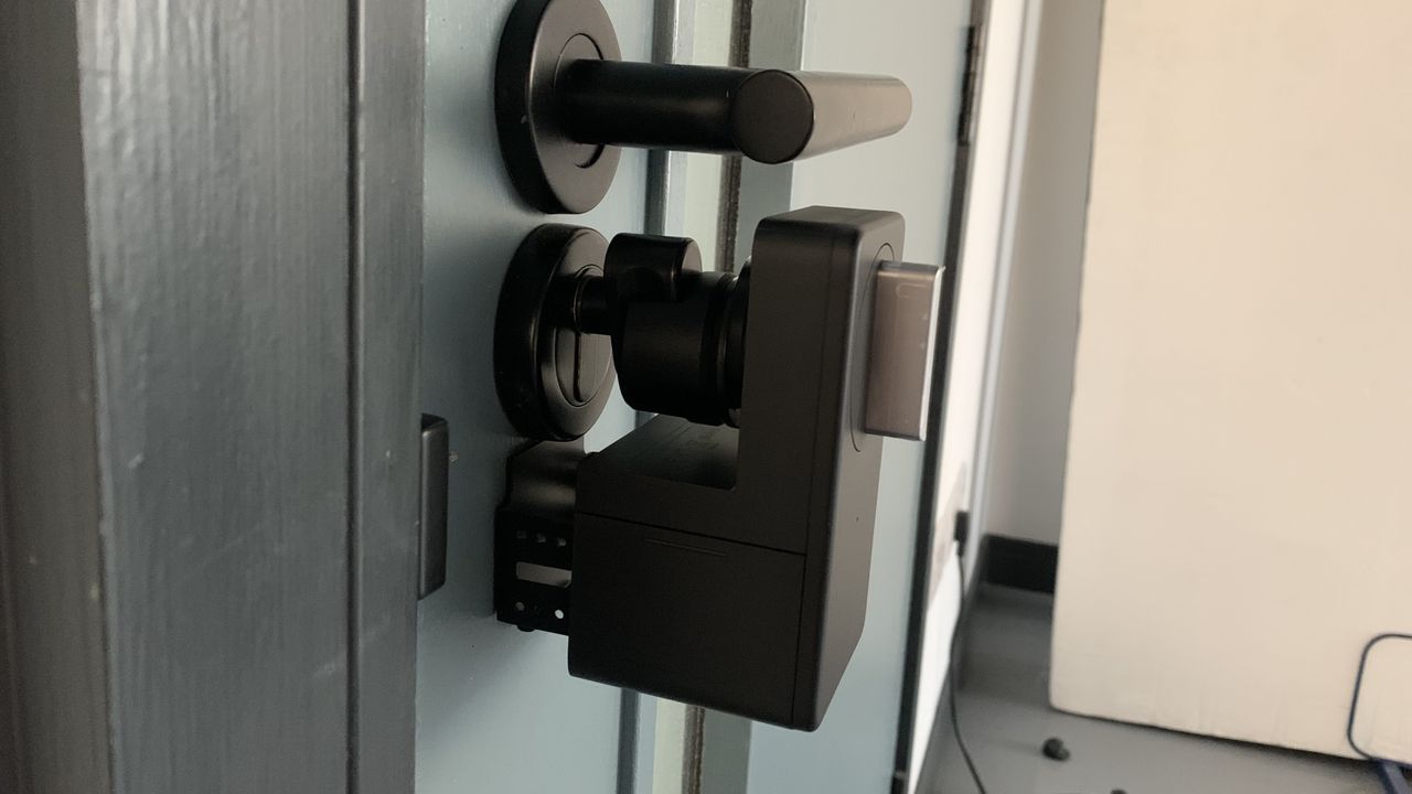 Side view of Switchbot Lock fitted on a door