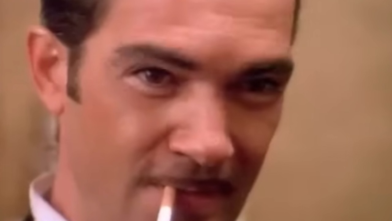 Antonio Banderas with a cigarette in his mouth in Four Rooms
