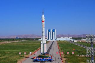 The Long March 2F rocket and Shenzhou 14 spacecraft roll out to their pad at China’s Jiuquan Satellite Launch Center on May 29, 2022.