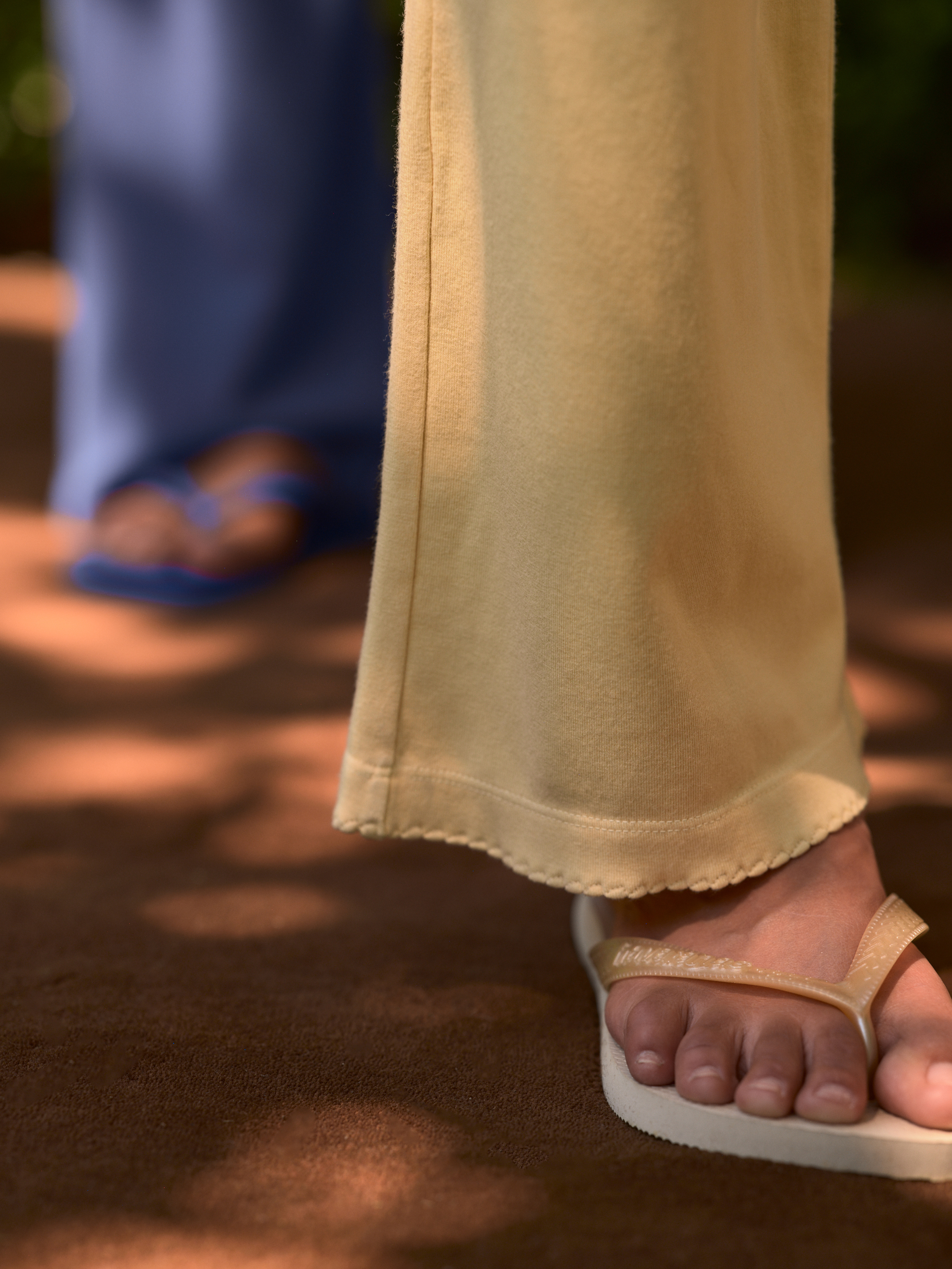 a close-up of donni's scalloped ribbed pants