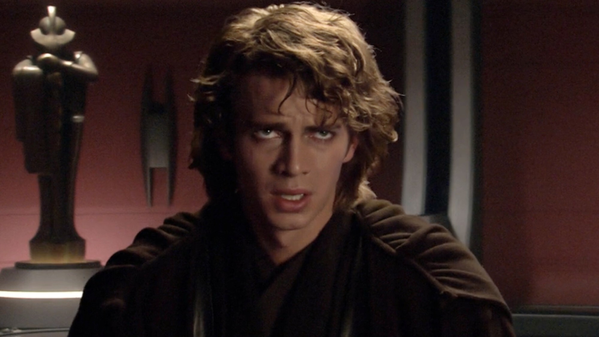 A screenshot of Hayden Christensen as Anakin Skywalker looking upset in Star Wars: Episode III