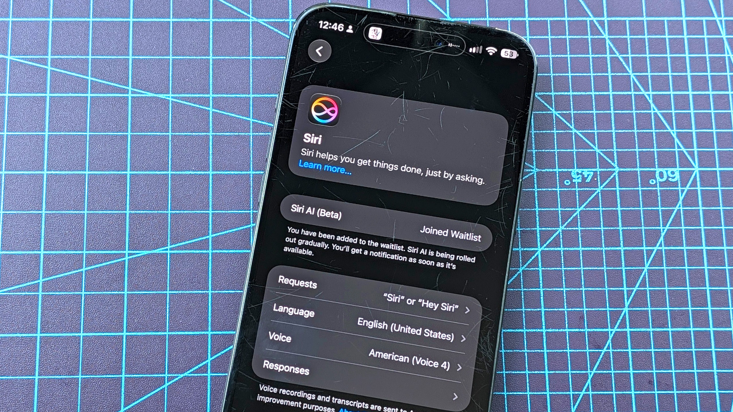 Close-up of the Siri AI setup process using an Apple Watch 11 and iPhone 16 Plus