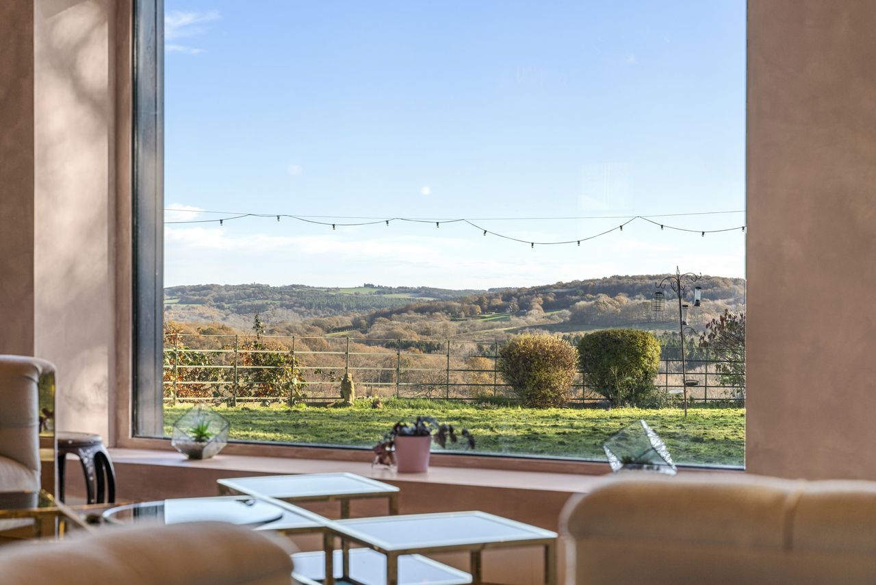 Images of the interiors and exteriors of Broad Oak in East Sussex