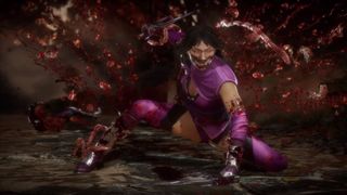 Mileena kneels in a spray of blood and her sister's intestines
