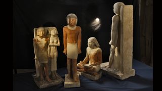A selection of statues depicting ancient Egyptians. 