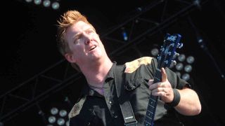 Them Crooked Vultures’ Josh Homme onstage in 2010