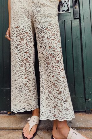 Cropped trousers with lace detail