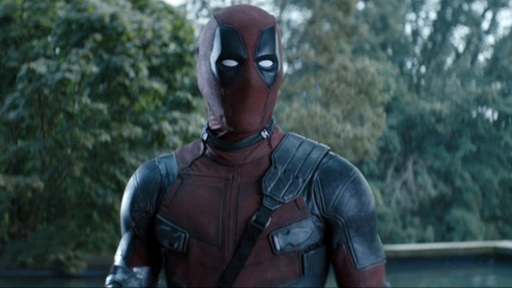 Wade Wilson (Ryan Reynolds) looks on at a fight in Deadpool 2.