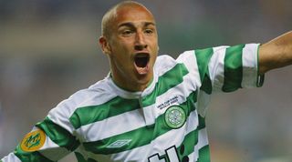 SEVILLE, SPAIN: (FILES) Photo taken 21 May 2004 shows Celtic FC Swedish forward Henrik Larsson after scoring for his team during the soccer UEFA Final Cup agaisnt FC Porto Seville. Larsson insists 30 April 2004 that he will still be leaving Scottish champions Celtic despite coming out of international reitrement to play for Sweden in the Euro 2004 finals in Portugal. AFP PHOTO CHRISTOPHE SIMON (Photo credit should read CHRISTOPHE SIMON/AFP via Getty Images)