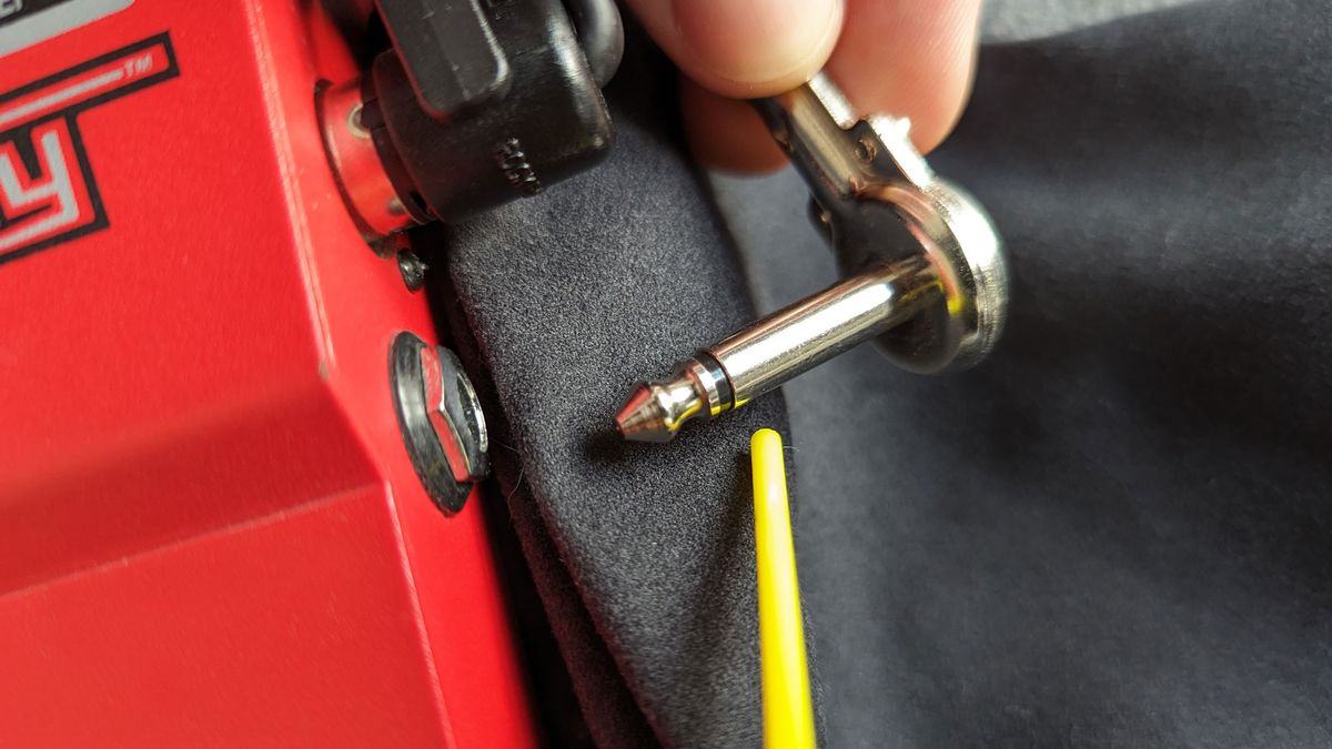 Close-up photos of cleaning a pedalboard with contact cleaner