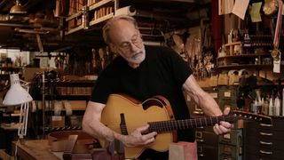 The legendary luthier Ken Parker in his workshop with one of his groundbreaking archtop designs.