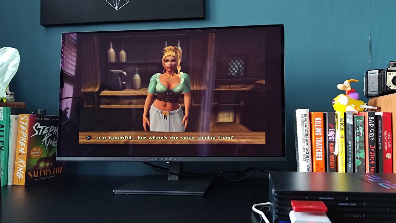 Alienware AW2726DM monitor with PS2 connected via upscaler and Baldur's Gate Dark Alliance gameplay on screen and stretched visuals at 720p.