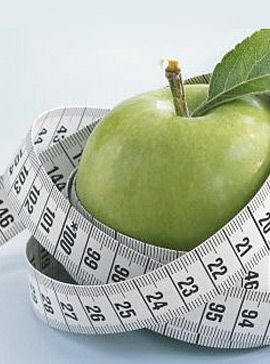 Apple with tape measure-diet tips-weight loss-woman and home